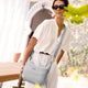 variant:46209861288128 Travelon Roam Anti-Theft Medium Crossbody Glacier