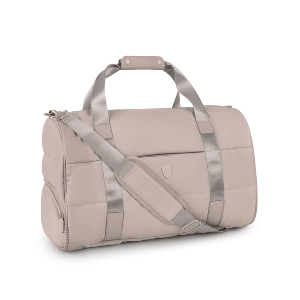 variant:46559246680256 The Puffer Softside Carry-On Duffel Bag Atmosphere